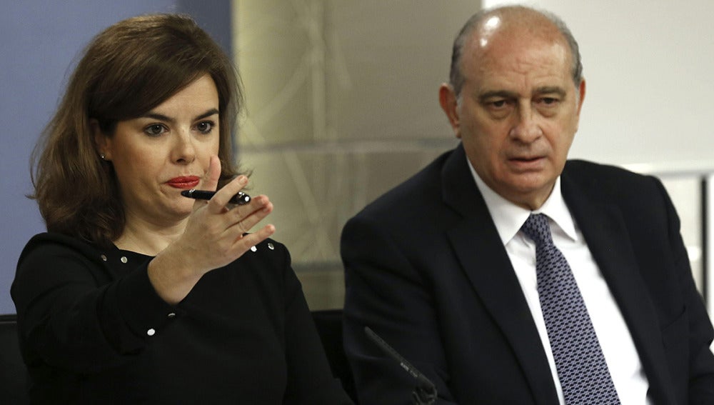 Soraya Sáez de Santamaría y el ministro del Interior, Jorge Fenández Díaz