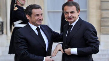 Sarkozy y Zapatero en el funeral