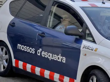Un coche de los Mossos d'Esquadra, en un suceso Un coche de los Mossos d'Esquadra, en un suceso
