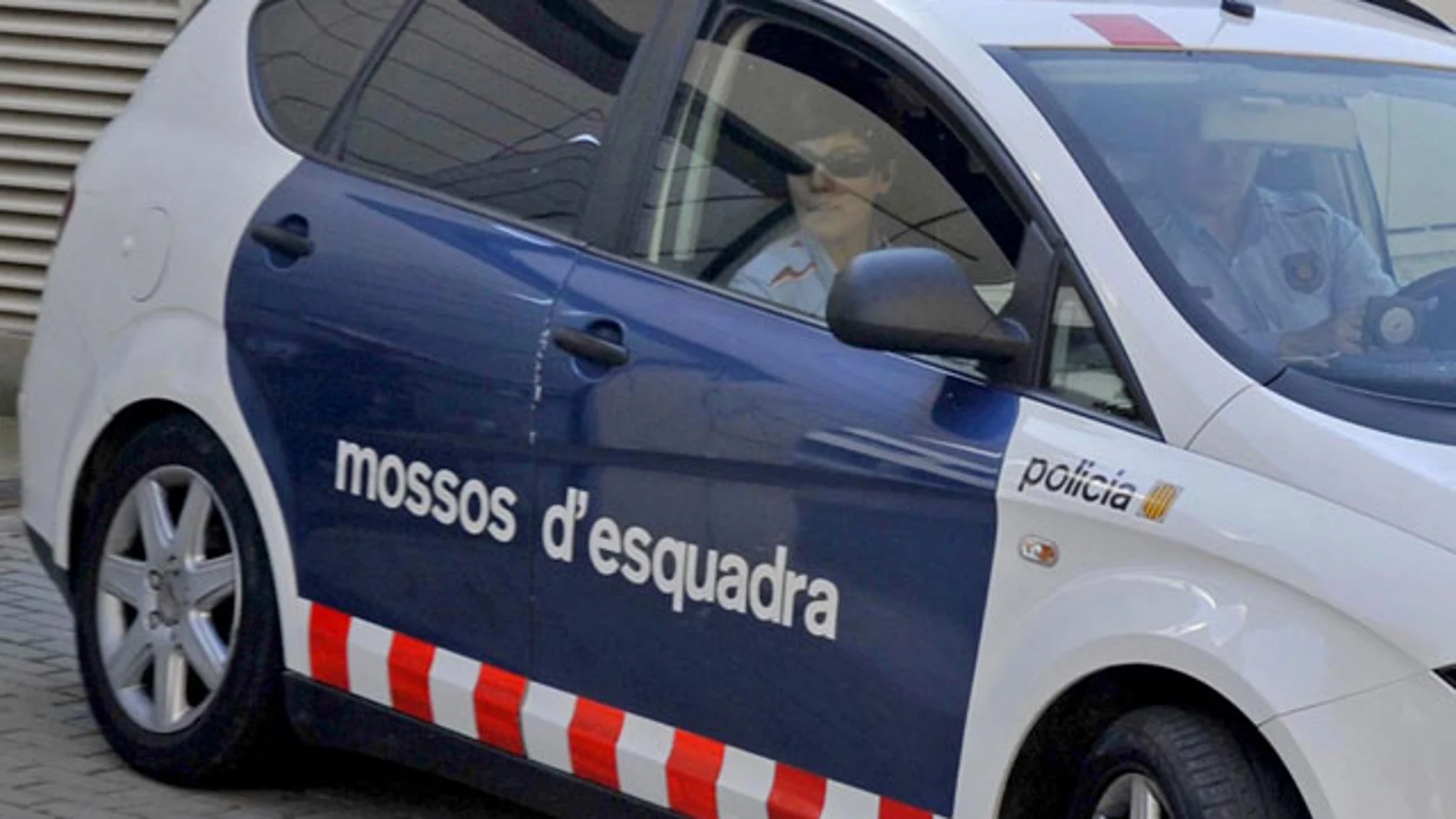 Un coche de los Mossos d'Esquadra, en un suceso Un coche de los Mossos d'Esquadra, en un suceso