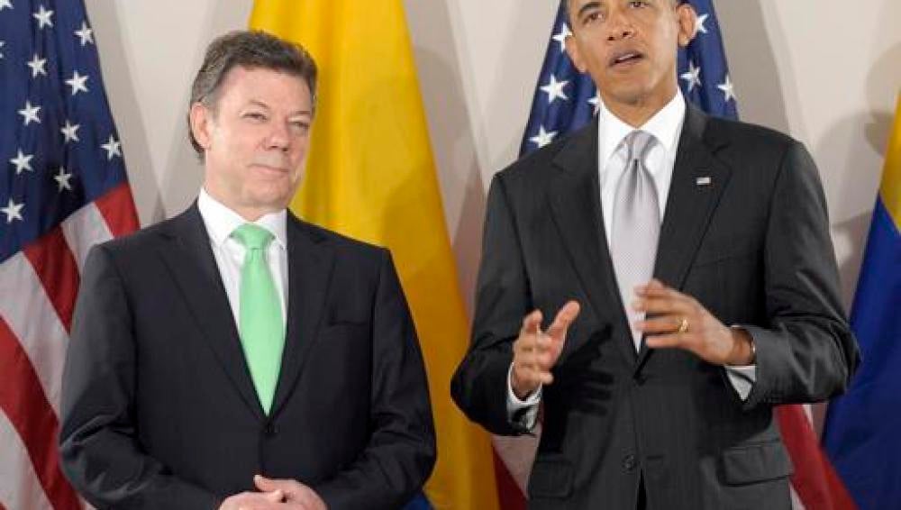 Juan Manuel Santos junto a Barack Obama