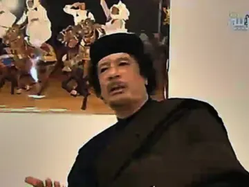 Gadafi, en la televisión libia Gadafi, en la televisión libia