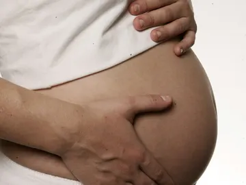 Una mujer embarazada Una mujer embarazada