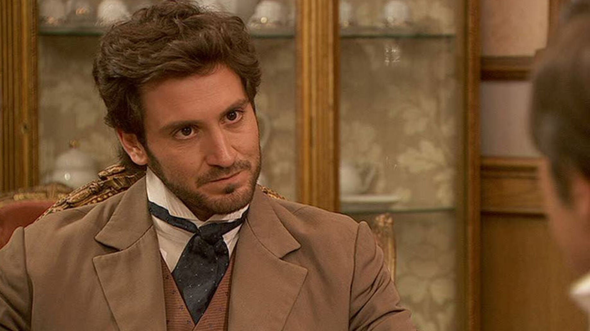 La conversaci&oacute;n entre Carlos y Trist&aacute;n