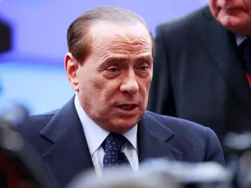 Berlusconi cree que Gadafi le quiere matar Berlusconi cree que Gadafi le quiere matar