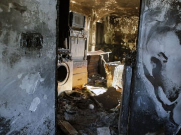 La mujer del fallecido en el incendio de Colmenar, oficialmente sospechosa La mujer del fallecido en el incendio de Colmenar, oficialmente sospechosa