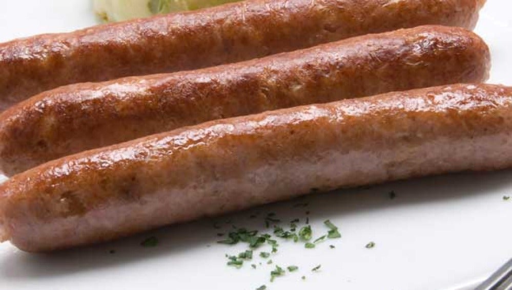 Salchicha con berza salteada
