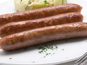 Salchicha con berza salteada Salchicha con berza salteada