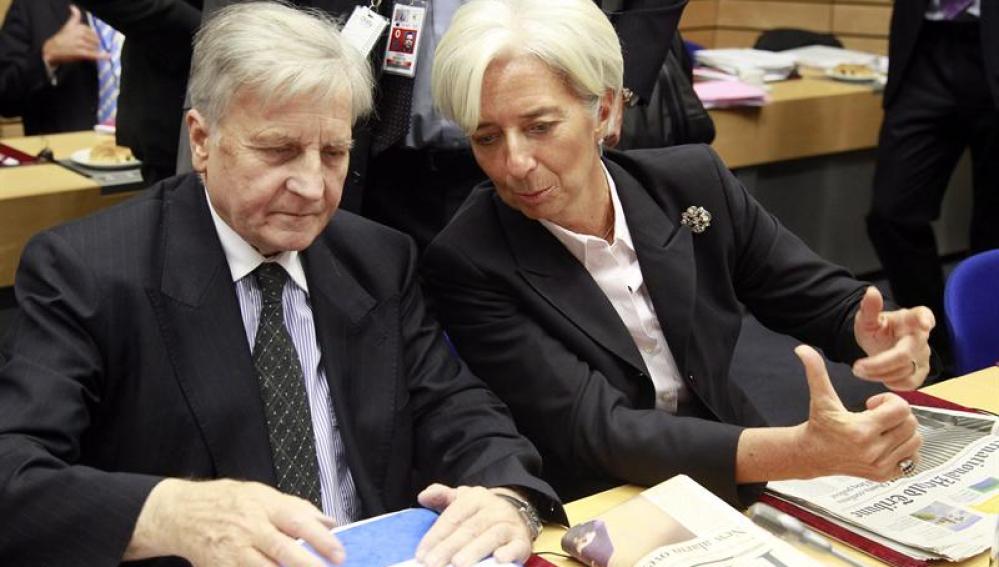 Lagarde y Trichet conversan