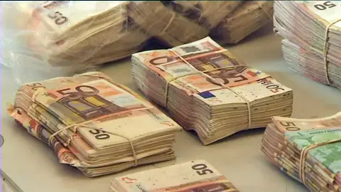 Billetes incautados en operación policial Billetes incautados en operación policial