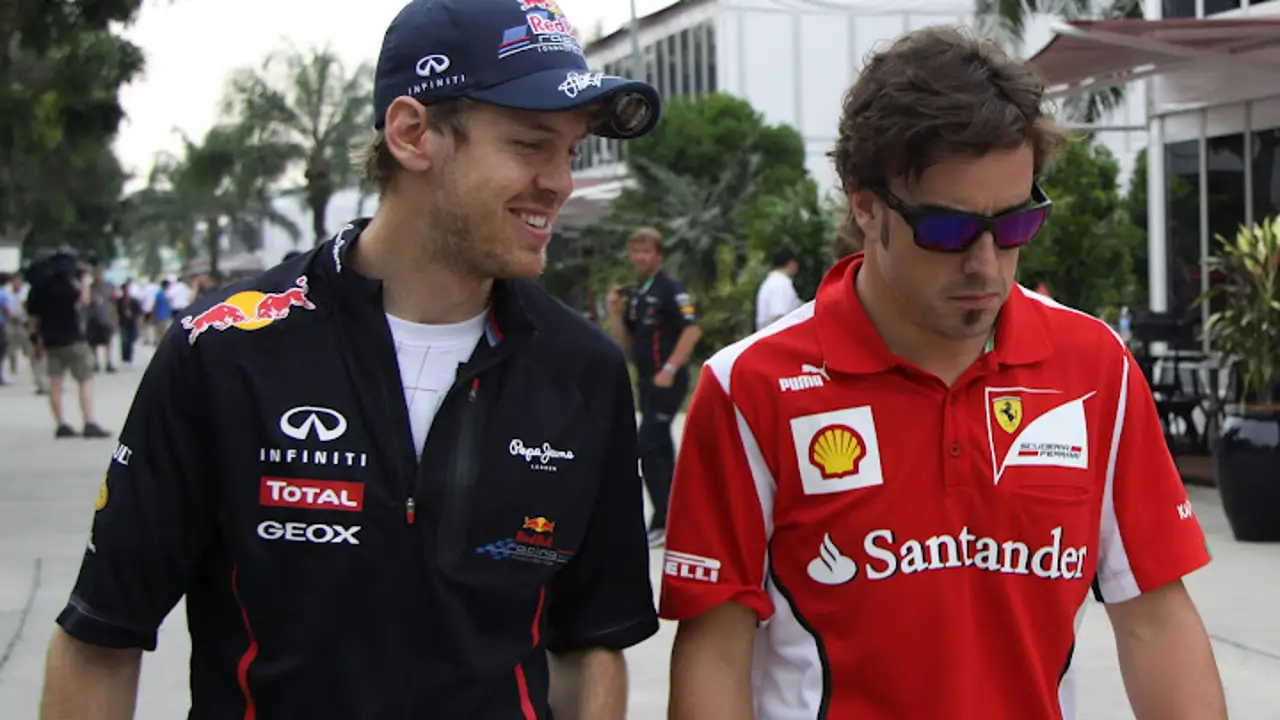 Alonso y Vettel conversan