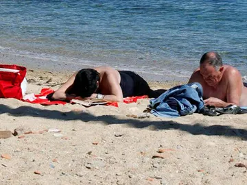 Bañistas en la playa Bañistas en la playa