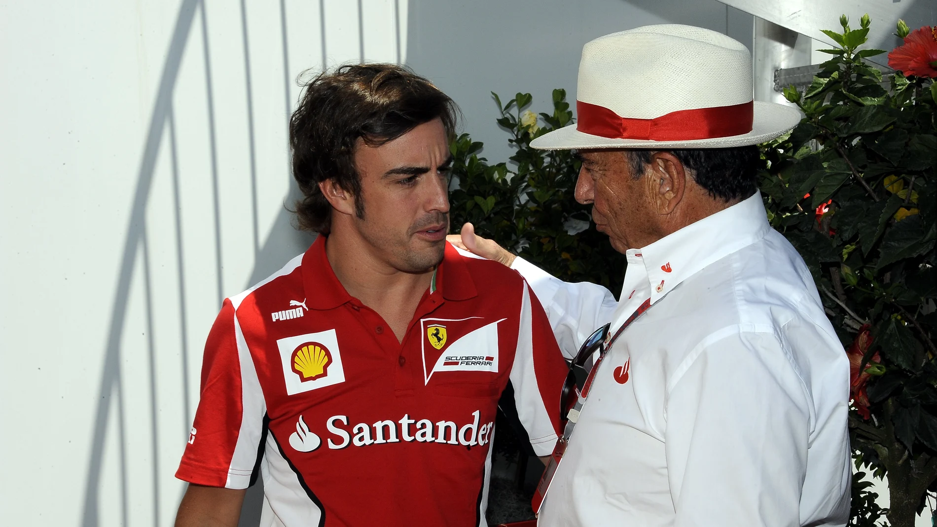 Alonso charla con Emilio Botín 