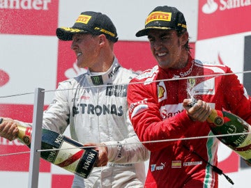 Schumacher y Alonso celebran su éxito