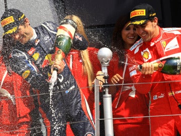 Webber y Alonso celebrando su 1ª y 2ª posición en el GP de Gran Bretaña