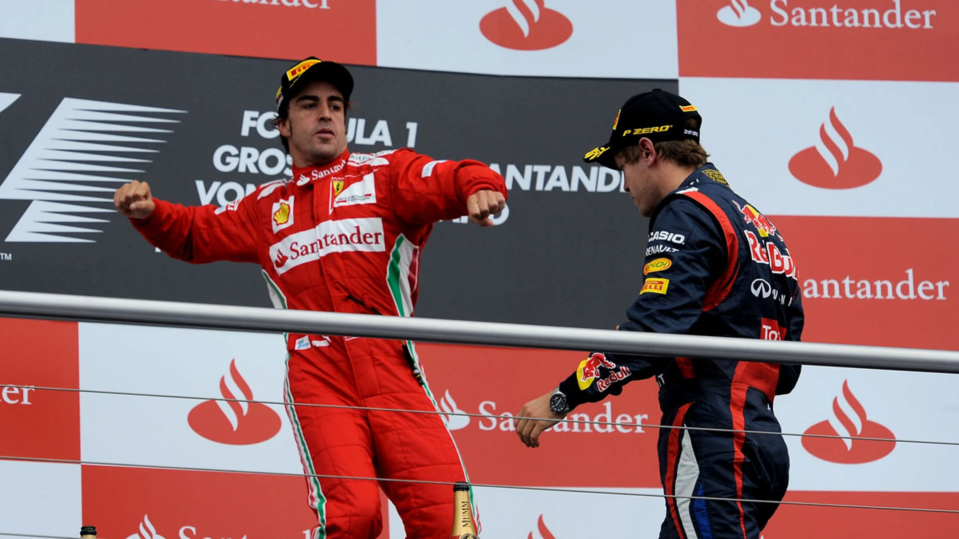 Fernando Alonso, en el podio del GP de Alemania junto a Vettel