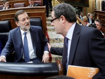 Rajoy conversa con el diputado de CIU Pere Macias