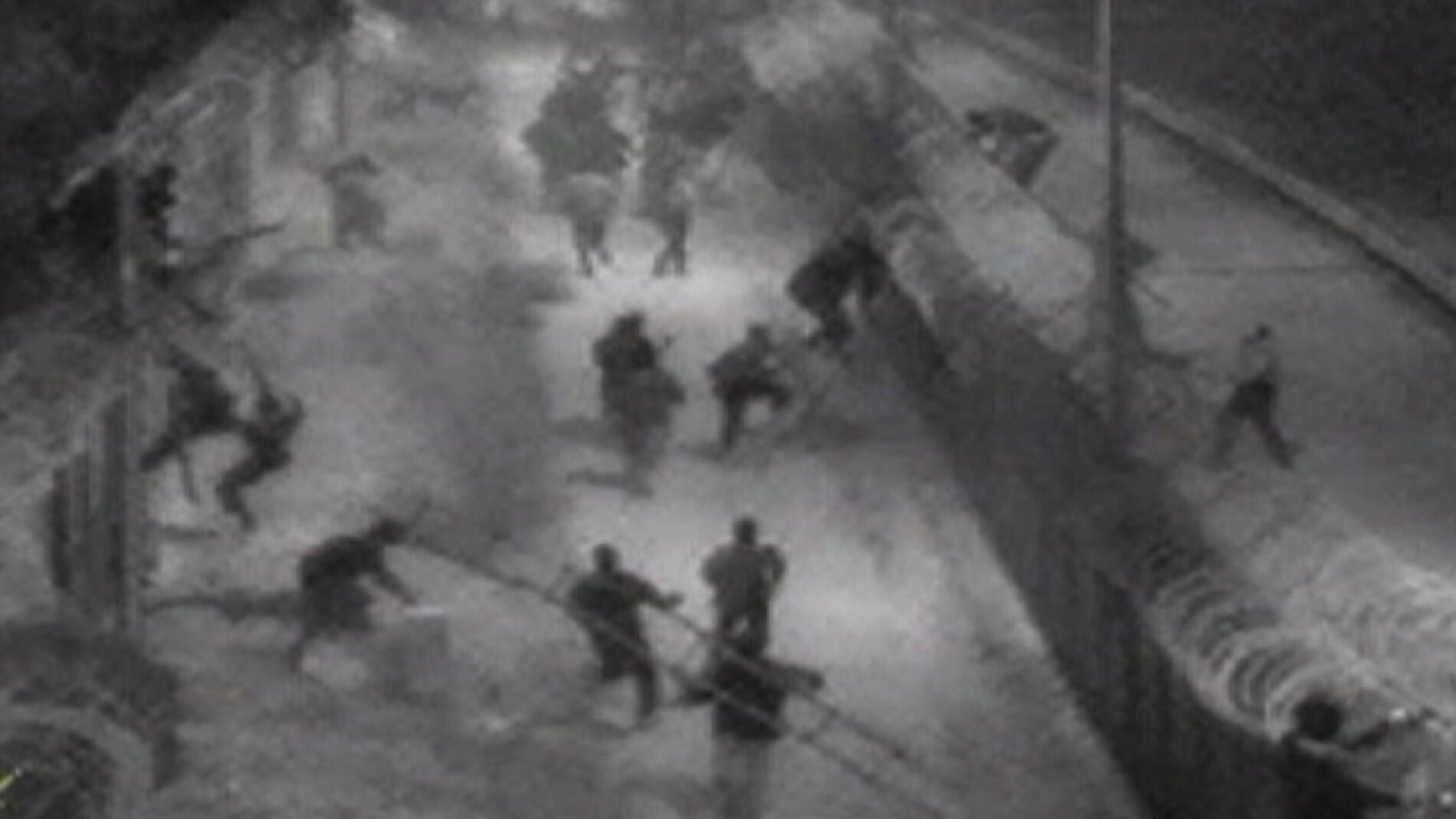 Inmigrantes asaltando la valla de Melilla