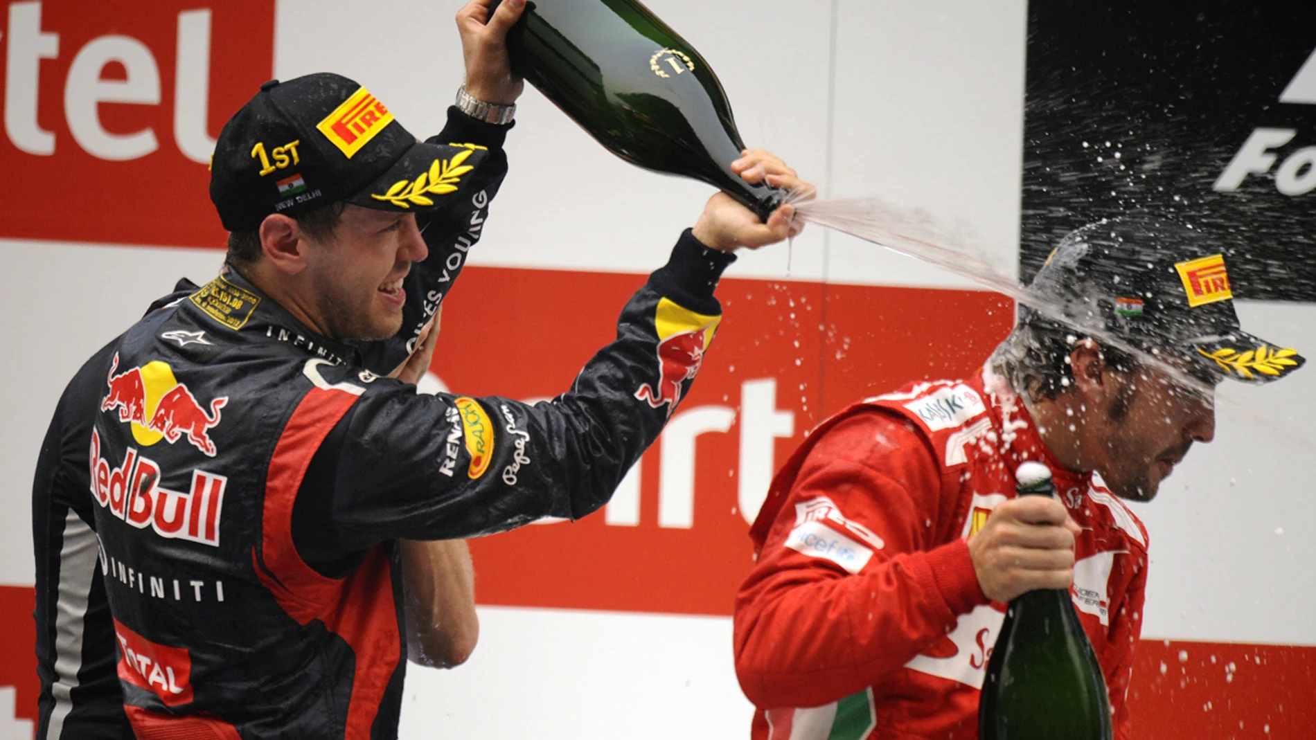 Vettel con Alonso en el podio