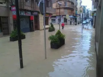 Una calle inundada en Linares Una calle inundada en Linares