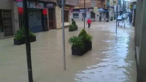 Una calle inundada en Linares Una calle inundada en Linares