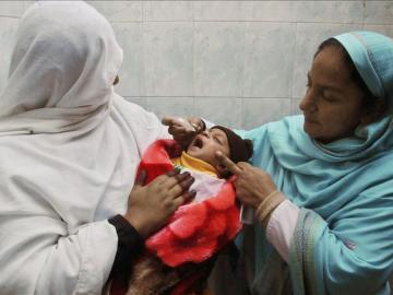 Vacunadores de la polio en Pakisktán
