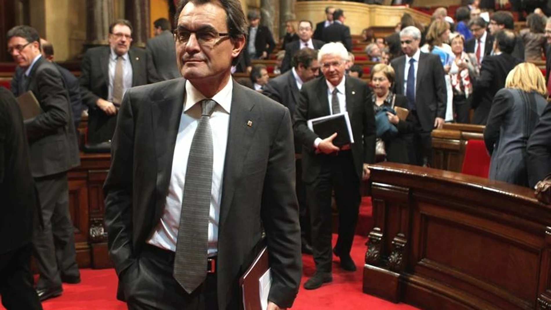 Artur Mas a su salida del hemiciclo tras su primera jornada de investidura. Artur Mas a su salida del hemiciclo tras su primera jornada de investidura.