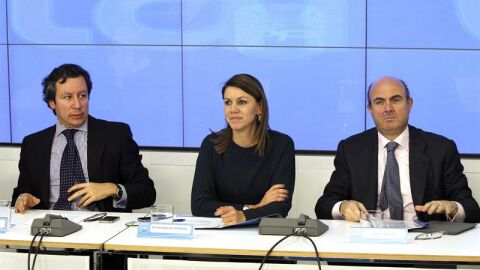 Carlos Floriano, Dolores de Cospedal y Luis de Guindos, en la sede del PP