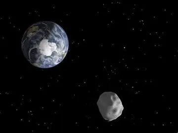 Un asteroide, muy cerca de la Tierra (archivo) Un asteroide, muy cerca de la Tierra (archivo)