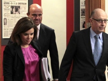  Soraya Sáenz de Santamaría, Luis de Guindos y Cristóbal Montoro