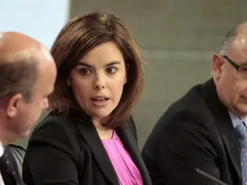 De Guindos, Sáenz de Santamaría y Montoro en rueda de prensa De Guindos, Sáenz de Santamaría y Montoro en rueda de prensa