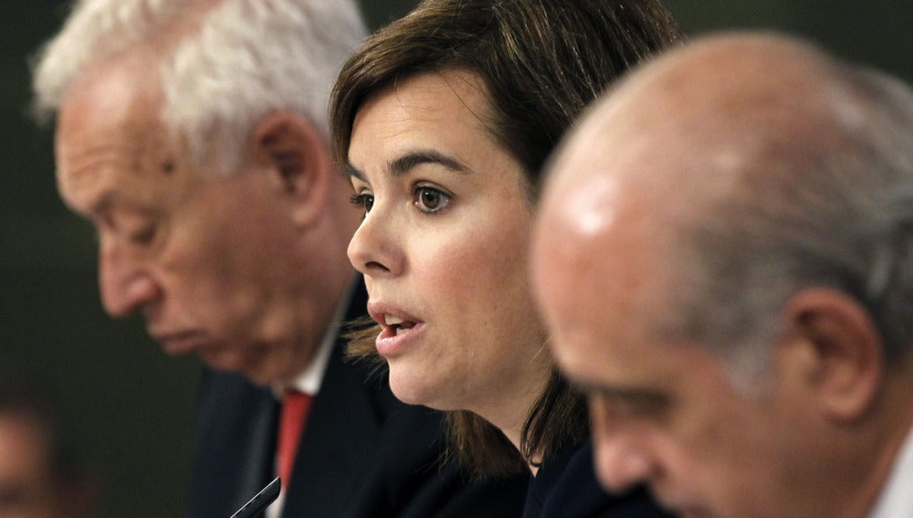 Soraya Sáenz de Santamaría, José Manuel García-Margallo y Jorge Fernández Díaz