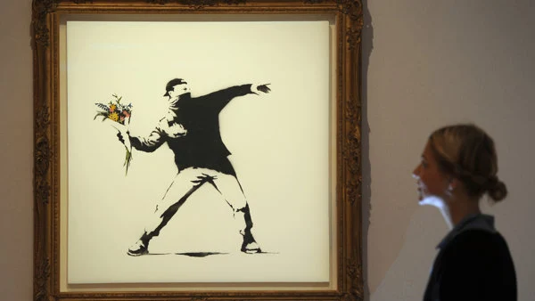 'Love is in the air' de Banksy 'Love is in the air' de Banksy