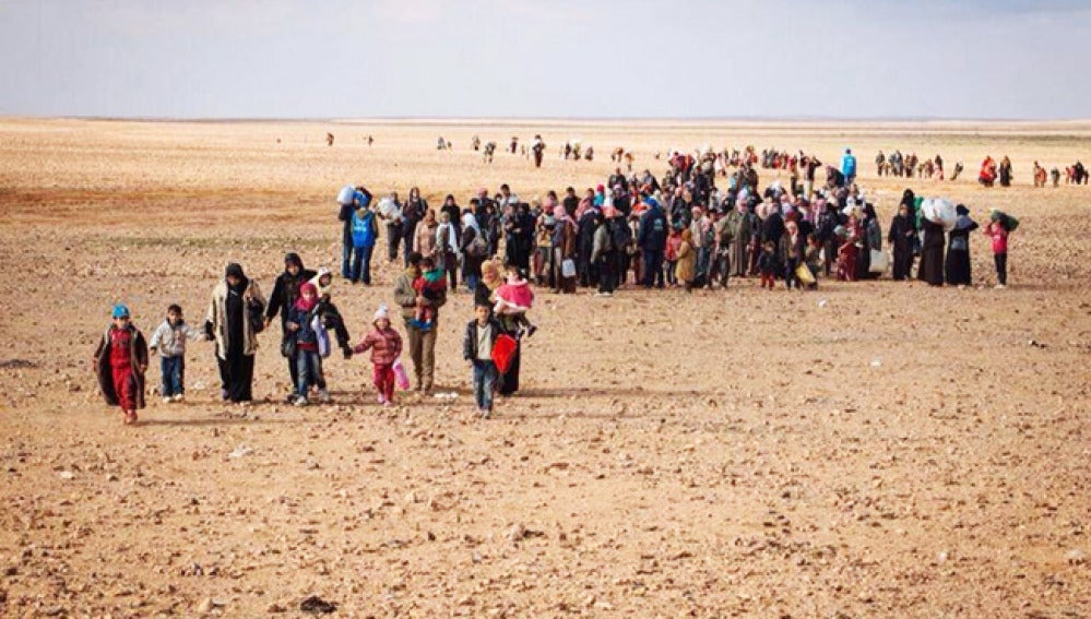 Grupo de refugiados sirios.