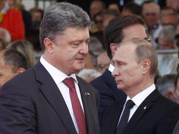 El presidente de Ucrania, Poroshenko, y Vladimir Putin