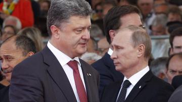 El presidente de Ucrania, Poroshenko, y Vladimir Putin