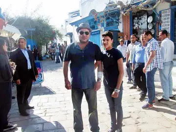 Mohamed VI posa con un chico Mohamed VI posa con un chico