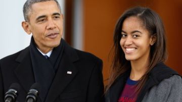 Barack Obama y su hija Malia