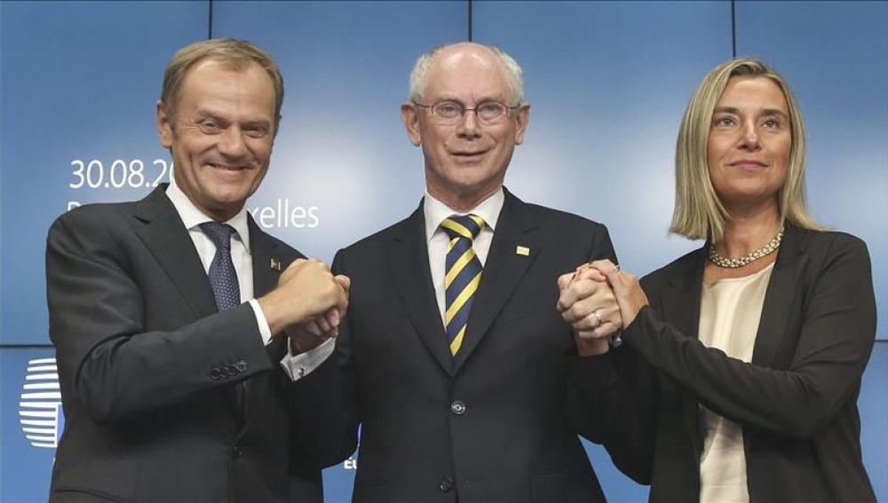 Tusk y Mogherini, junto a Herman Van Ronpuy