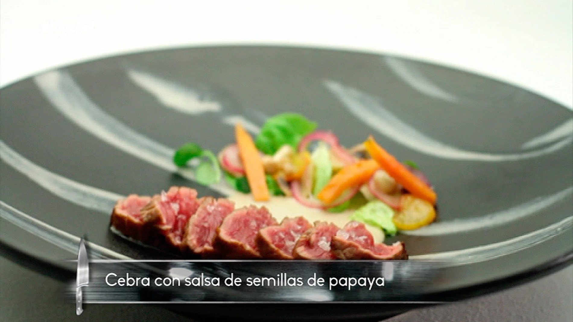 La cebra con salsa de semillas de papaya