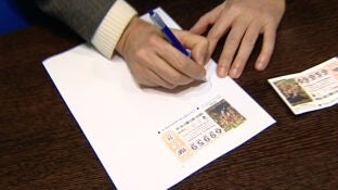 Firman una participaci&oacute;n de la Loter&iacute;a 