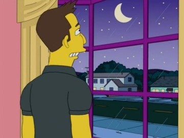 Ellon Musk observa la luna desde la ventana de Los Simpson