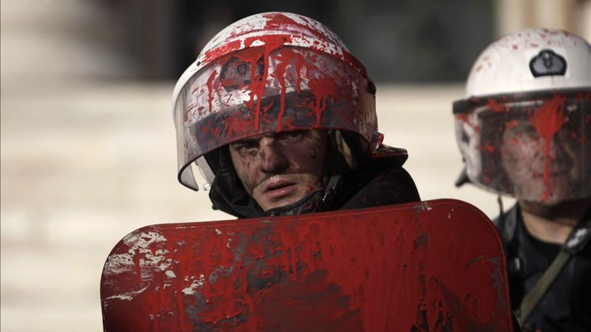 Manifestantes contra la Polic&iacute;a de Grecia