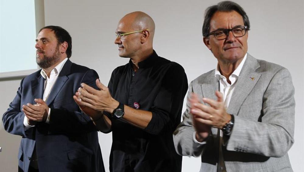 Artur Mas, Raúl Romeva y Oriol Junqueras en la presentación del programa