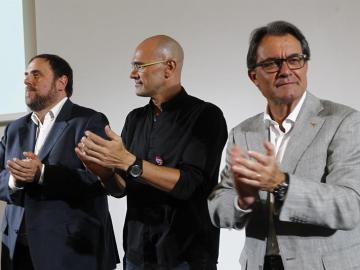 Artur Mas, Raúl Romeva y Oriol Junqueras en la presentación del programa