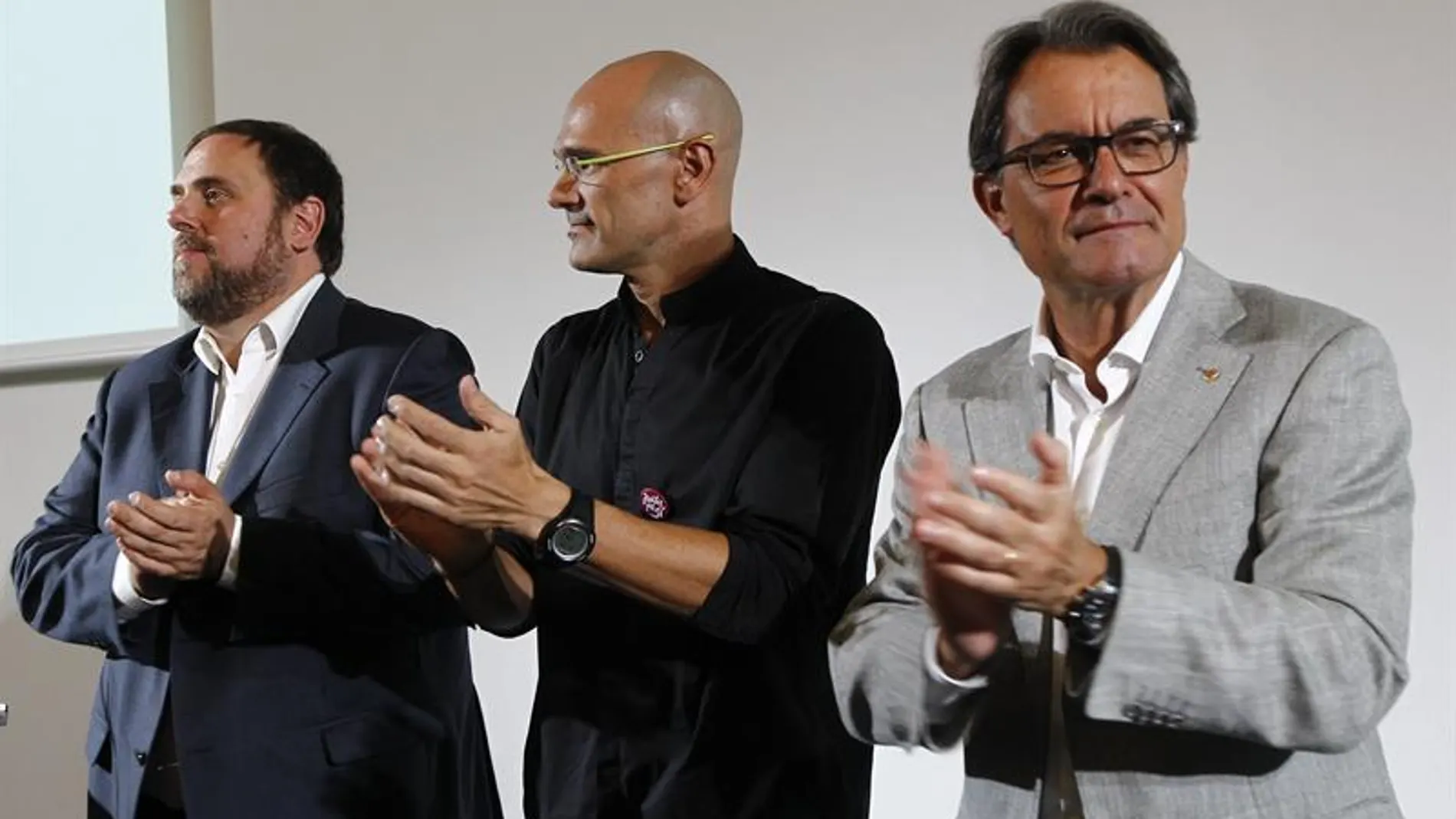 Artur Mas, Raúl Romeva y Oriol Junqueras en la presentación del programa Artur Mas, Raúl Romeva y Oriol Junqueras en la presentación del programa