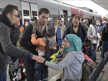 Refugiados en una estación de tren Refugiados en una estación de tren