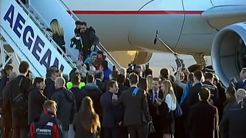 Los primeros refugiados que parten de Grecia a Luxemburgo Los primeros refugiados que parten de Grecia a Luxemburgo