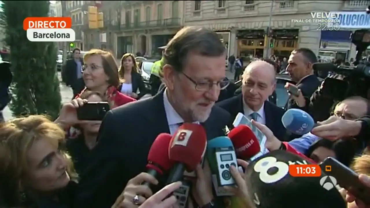 Rajoy, a su entrada en un acto en Barcelona: "Voy a seguir dando paseos"