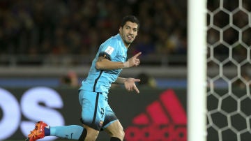 Luis Suárez celebra un gol ante el Guangzhou